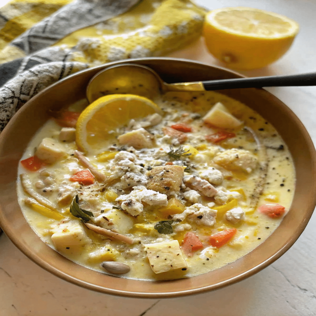 Juicy Greek Lemon Chicken garnished with fresh herbs and lemon slices, Greek Lemon Chicken