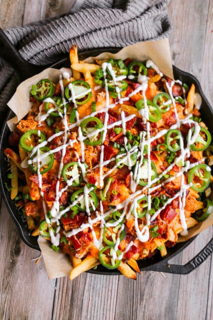 Topped Fries with melted cheese, crispy bacon, and sour cream.