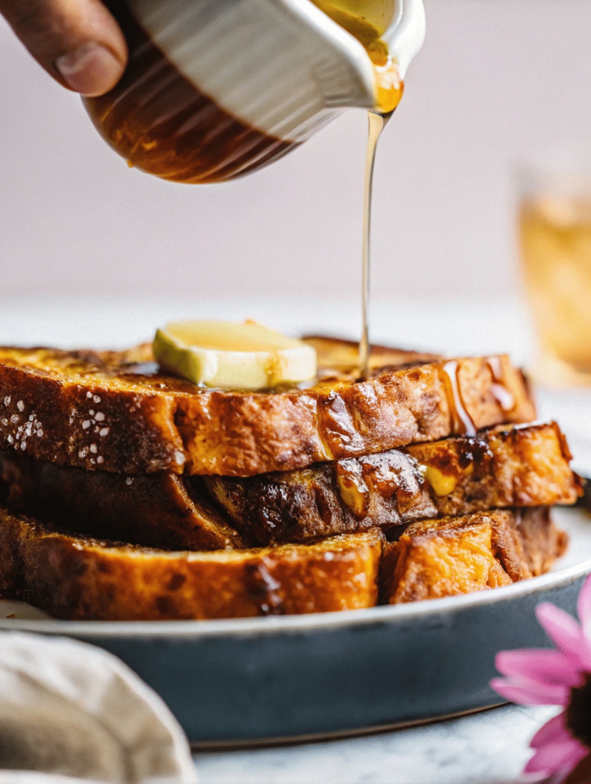 Crispy French toast with a dusting of powdered sugar