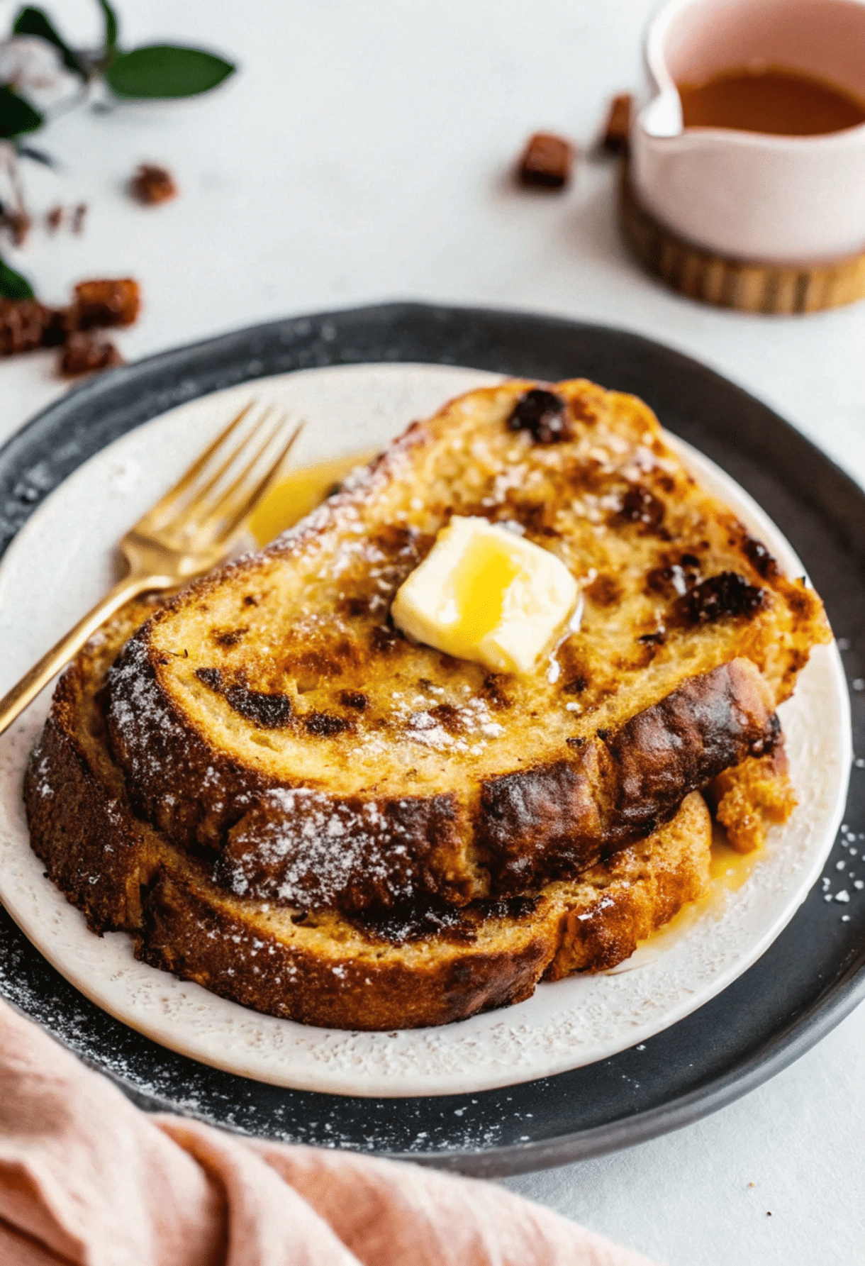 Sourdough French toast on a plate with a fork