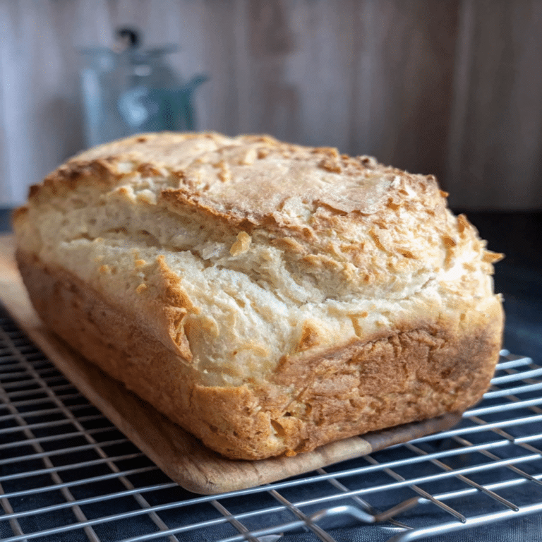 Freshly baked yogurt bread with a golden crust and soft, fluffy interior