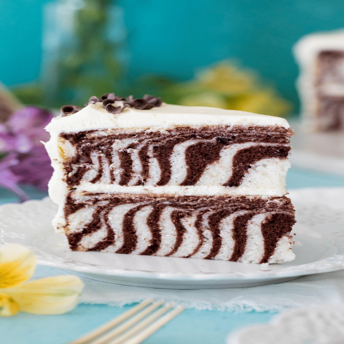 Zebra Cakes Recipe – A whole homemade zebra cake with chocolate glaze and striped pattern.